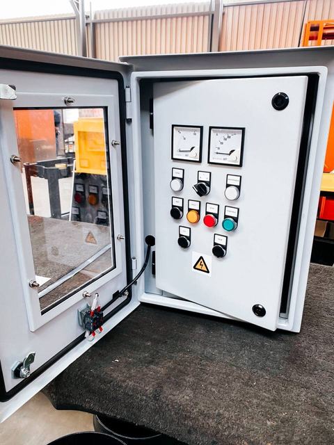 Open local control station panel with meters and selector switches