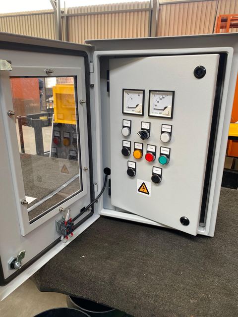 Open local control station panel showing meters, indicator lamps and push buttons